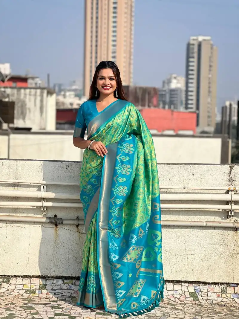Pista green soft silk blend zari woven patola saree with contrast weaves
