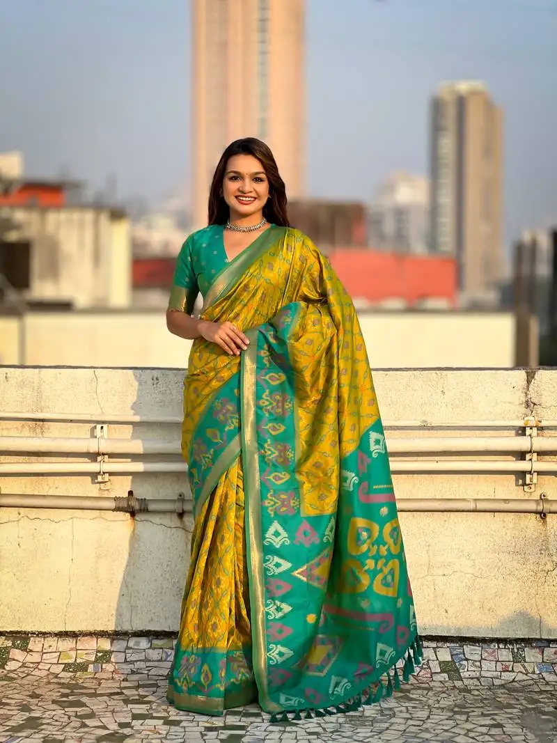 Mehendi green soft silk blend zari woven patola saree with contrast weaves