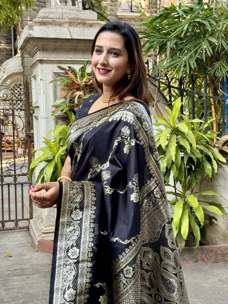 Trending black banarasi jaal soft silk blend zari woven saree