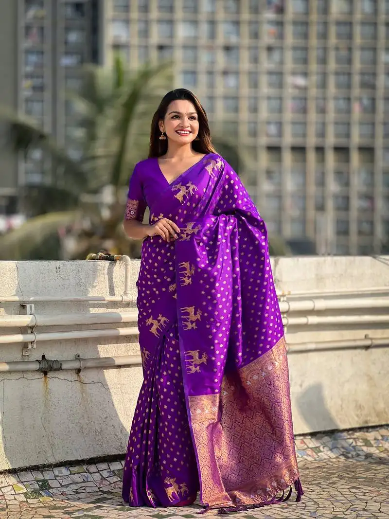 Purple soft silk blend dual zari woven saree with deer border