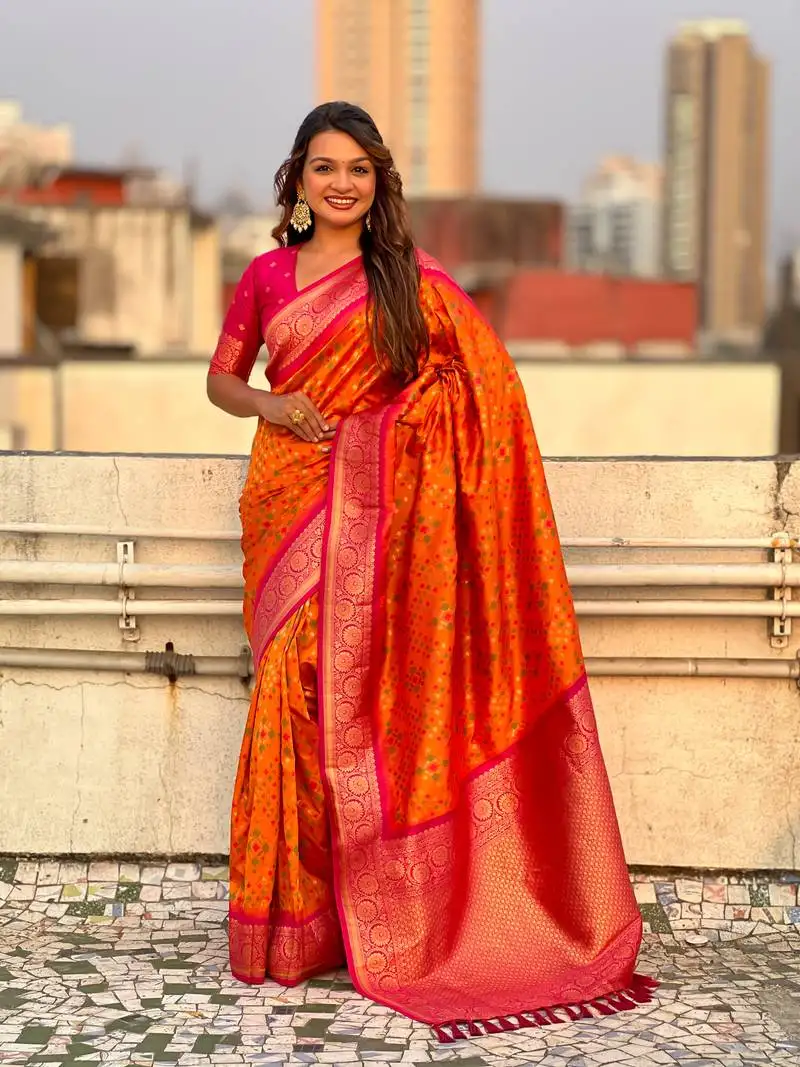 Orange soft silk blend zari woven premium patola saree with contrast weaves