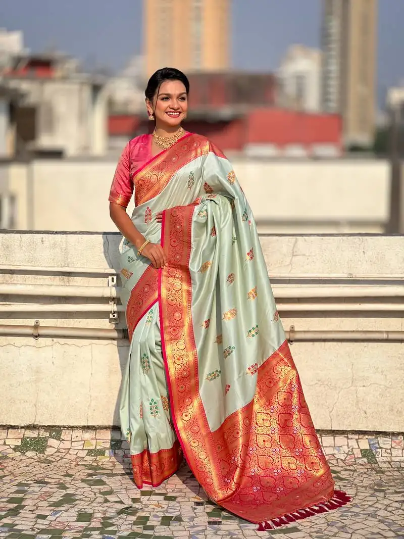 Sky blue soft silk blend saree with flower butta meenakari zari woven saree