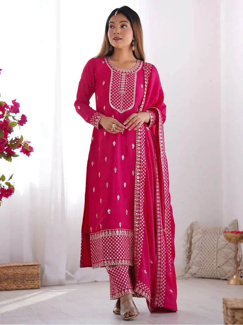 Elegant pink suit set with embroidered dupatta and flowing palazzo stitched