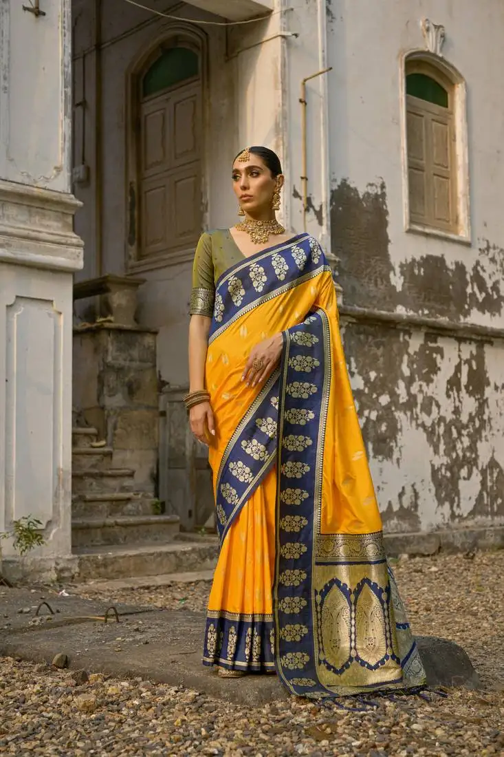 Yellow banarasi silk weaving saree with zari woven fancy tassels