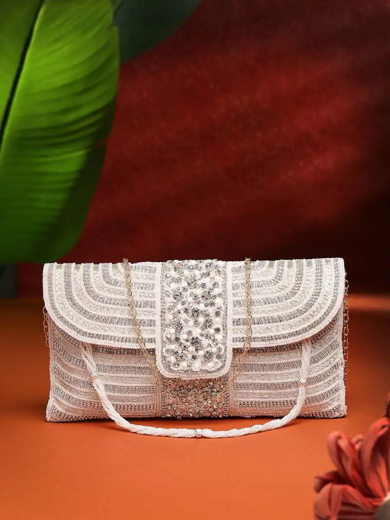 Adorn white & gold stone work embellished faux silk clutch