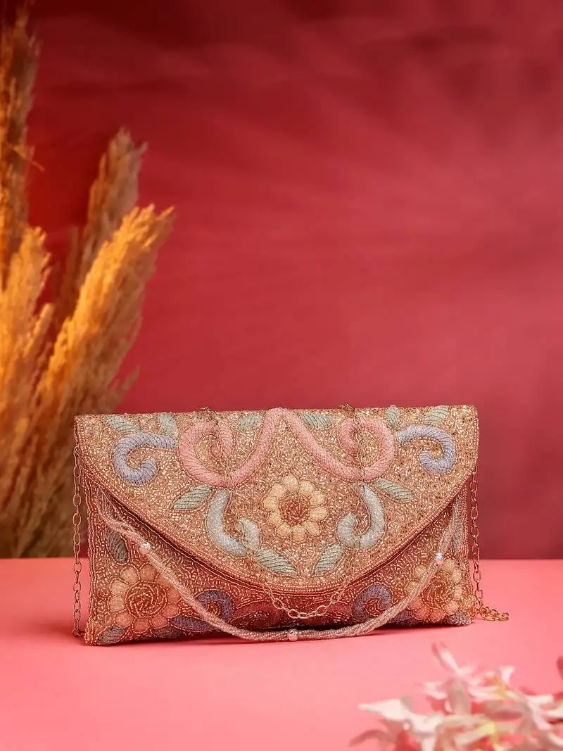Adorn coral & multi floral embellished faux silk clutch