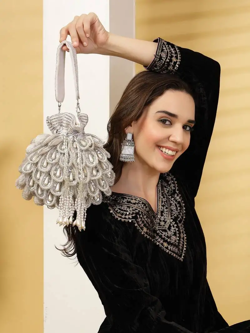 Droop white & silver cut work embellished velvet potli