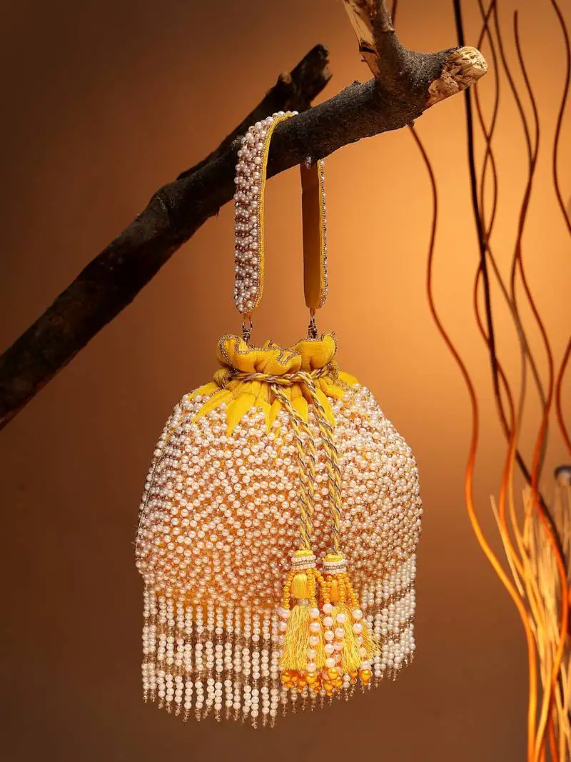 Droop honey yellow & pearl chevron embellished velvet potli