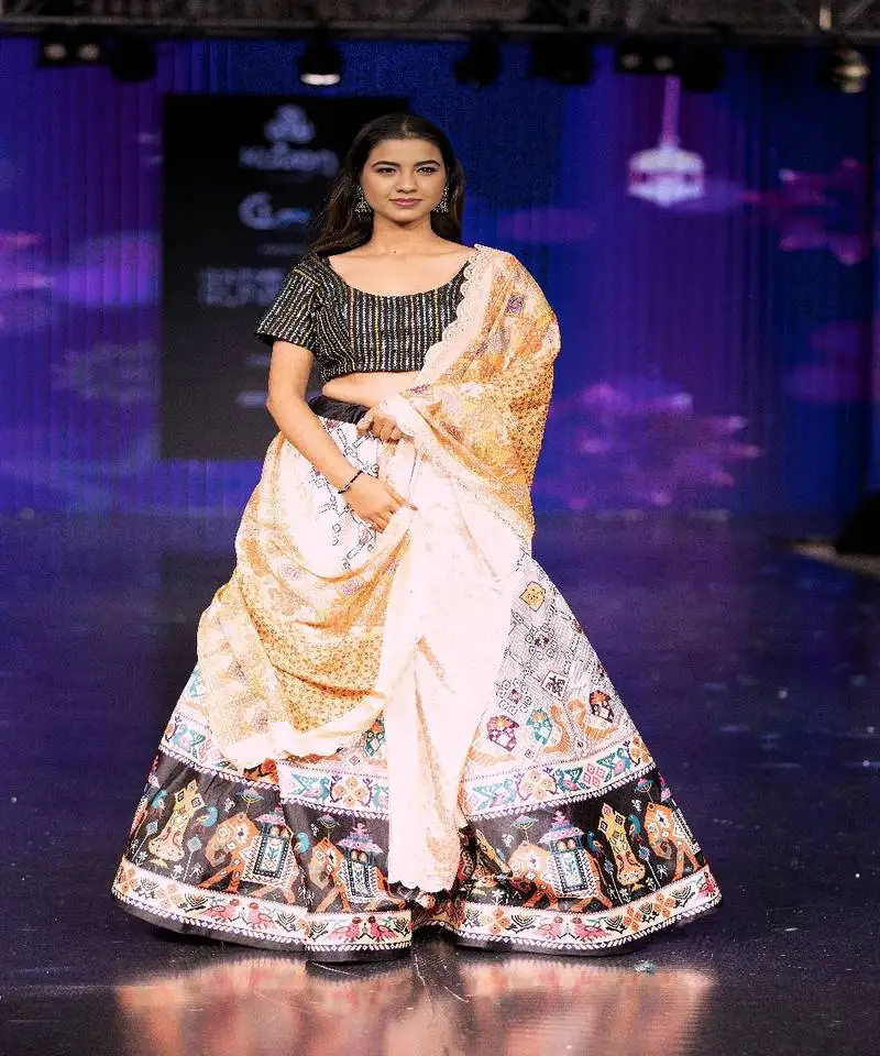 Black motif print shiney satin lehenga choli with unstitched multi sequin blouse and shiney chinon silk dupatta