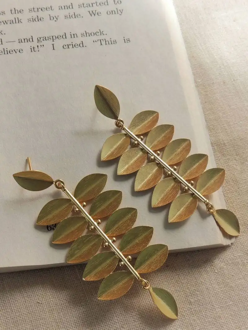 Gold leaf shape statement earring