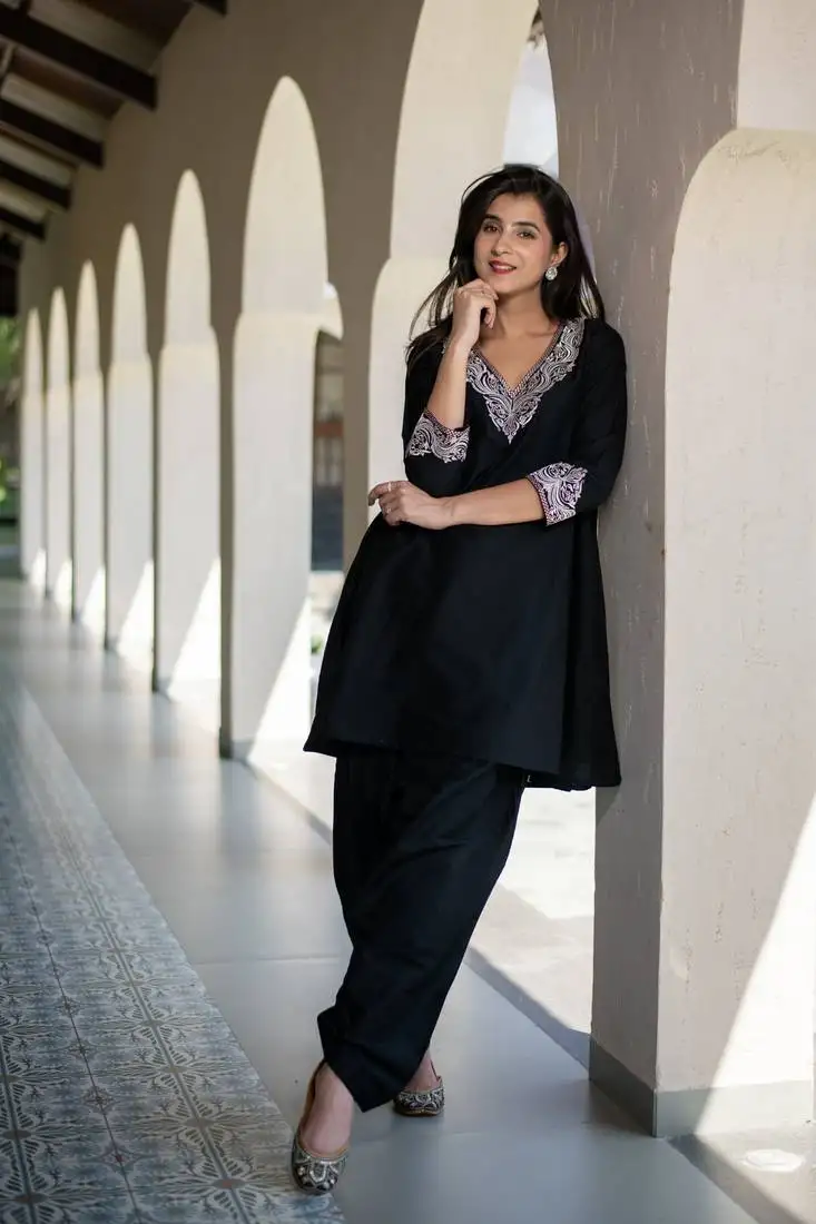 Black short kurta embroidered co-ord set.