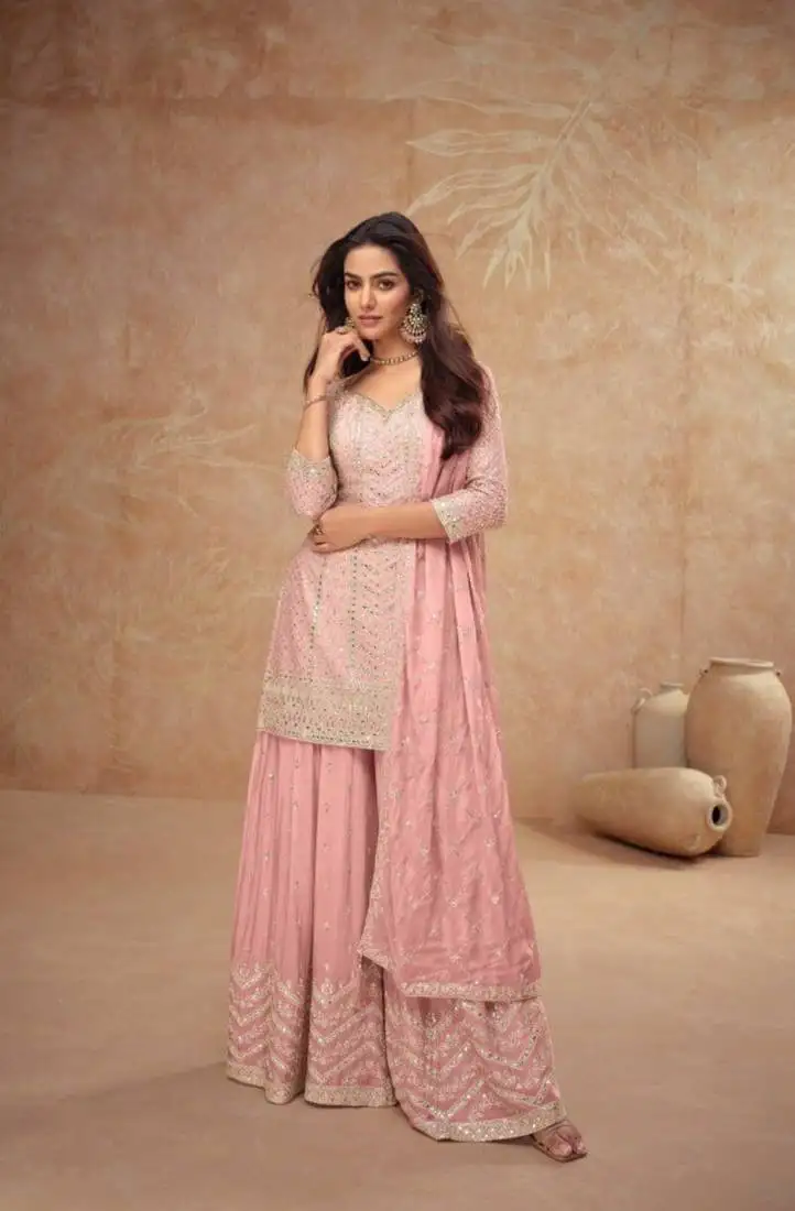 Baby pink free size full stitched upto 42 palazzo wedding suits