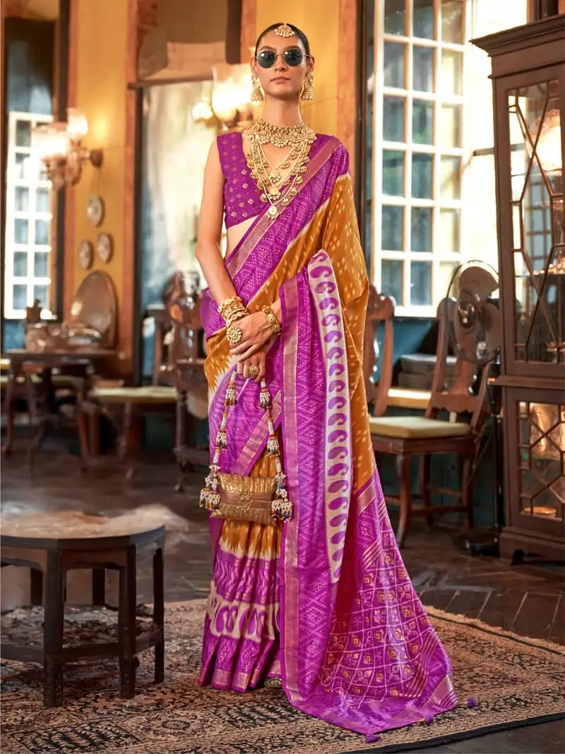 Orange polyester viscose silk patola printed saree