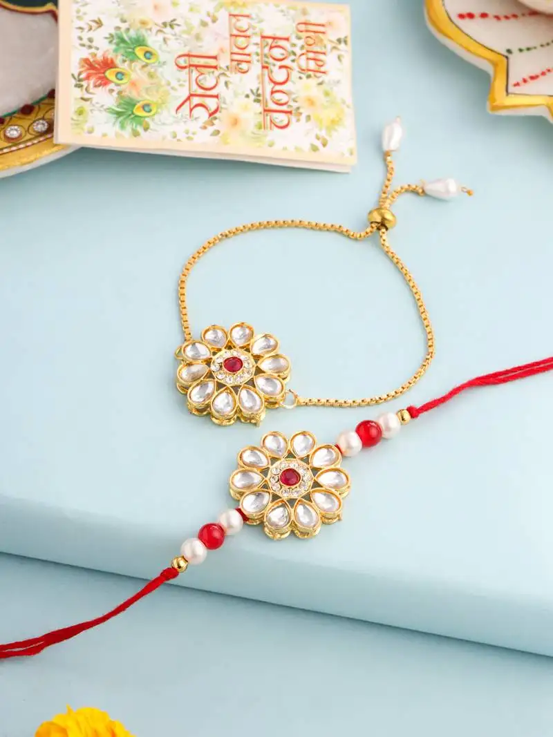 Set of 2 gold toned kundan studded floral design bhaiya bhabhi rakhi set with roli chawal chandan & mishri