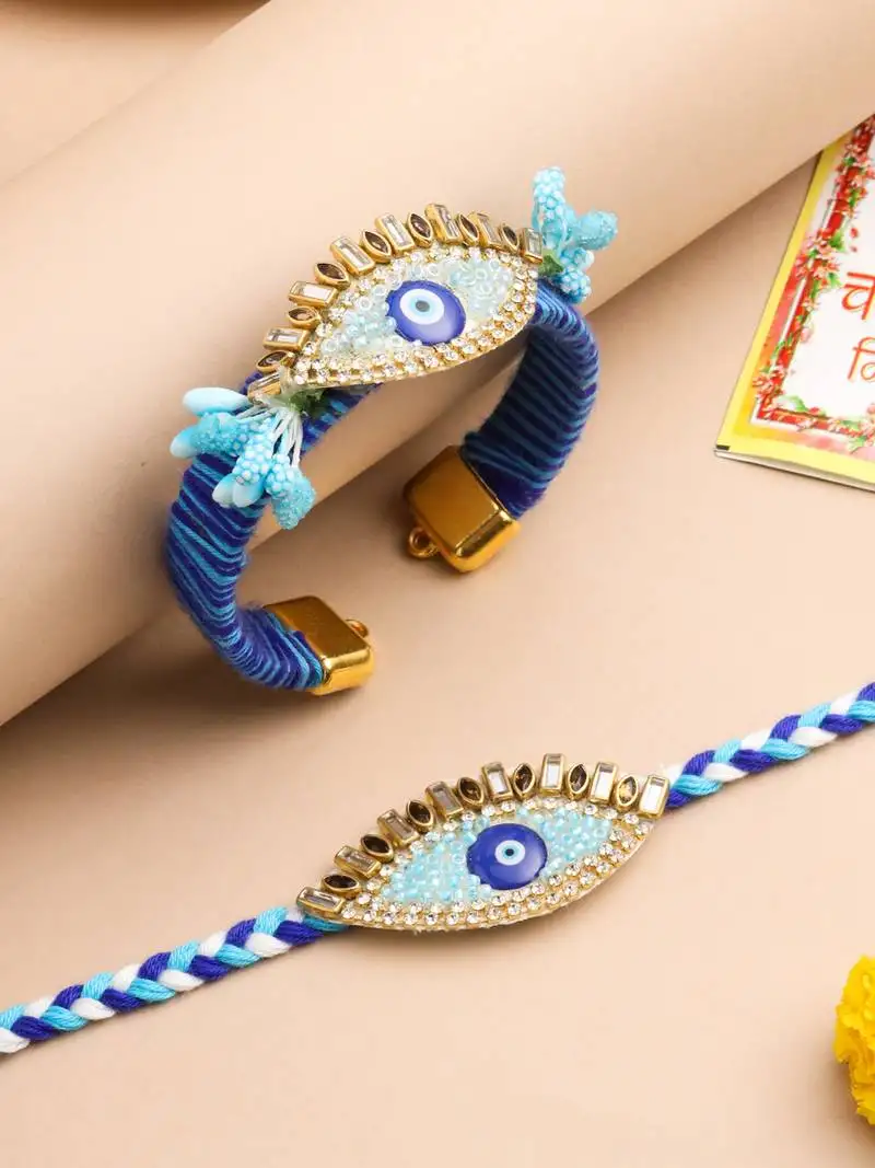 set of 2 blue evil eye & kundan studded handcrafted bhaiya bhabhi rakhi with roli chawal chandan & mishri