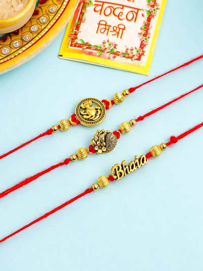 set of 3 gold toned thread rakhi with roli chawal chandan & mishri