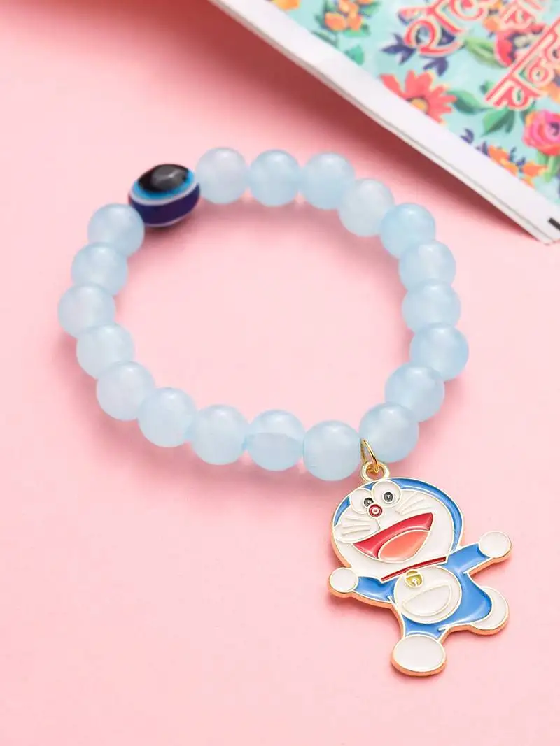 Kids cartoon design sky blue artificial beads thread rakhi with roli chawal chandan & mishri