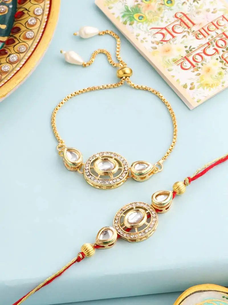 set of 2 gold toned kundan studded bhaiya bhabhi rakhi with roli chawal chandan & mishri