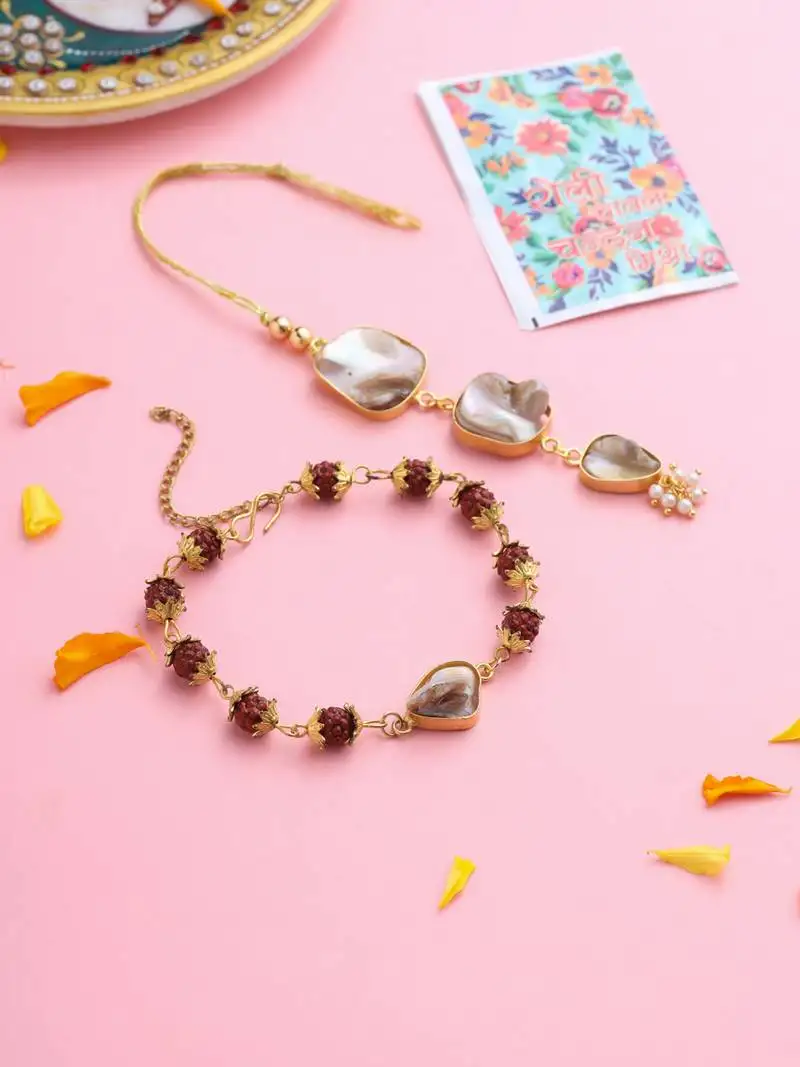 set of 2 gold toned rudraksh & pearls bhaiya bhabhi rakhi with roli chawal chandan & mishri