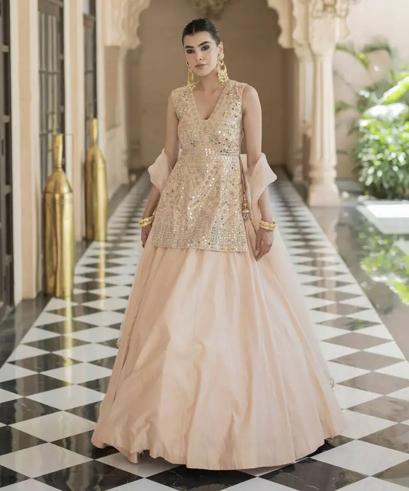 Pink mirror embroidered kurta paired with chanderi lehenga set