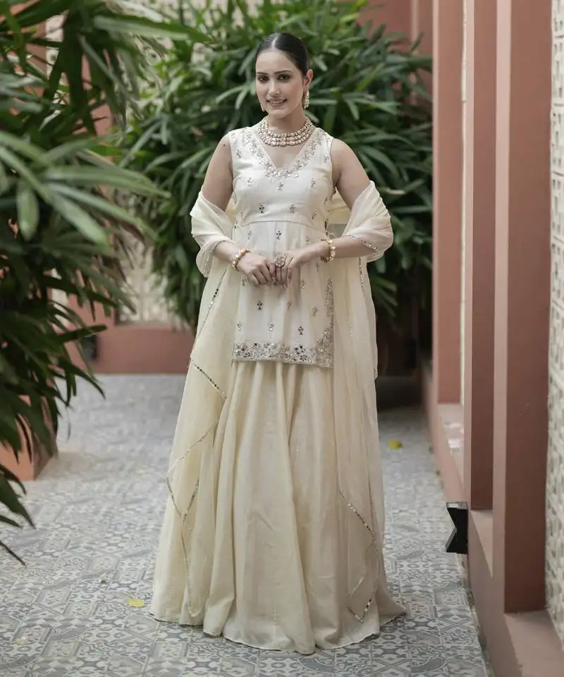 Off white mirror embroidered kurta paired with chanderi lehenga set