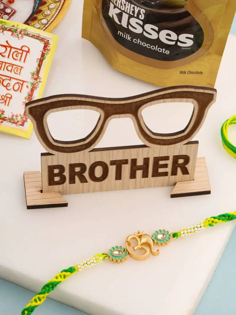 Men green kundan studded om design thread rakhi, combo for rakshabandhan