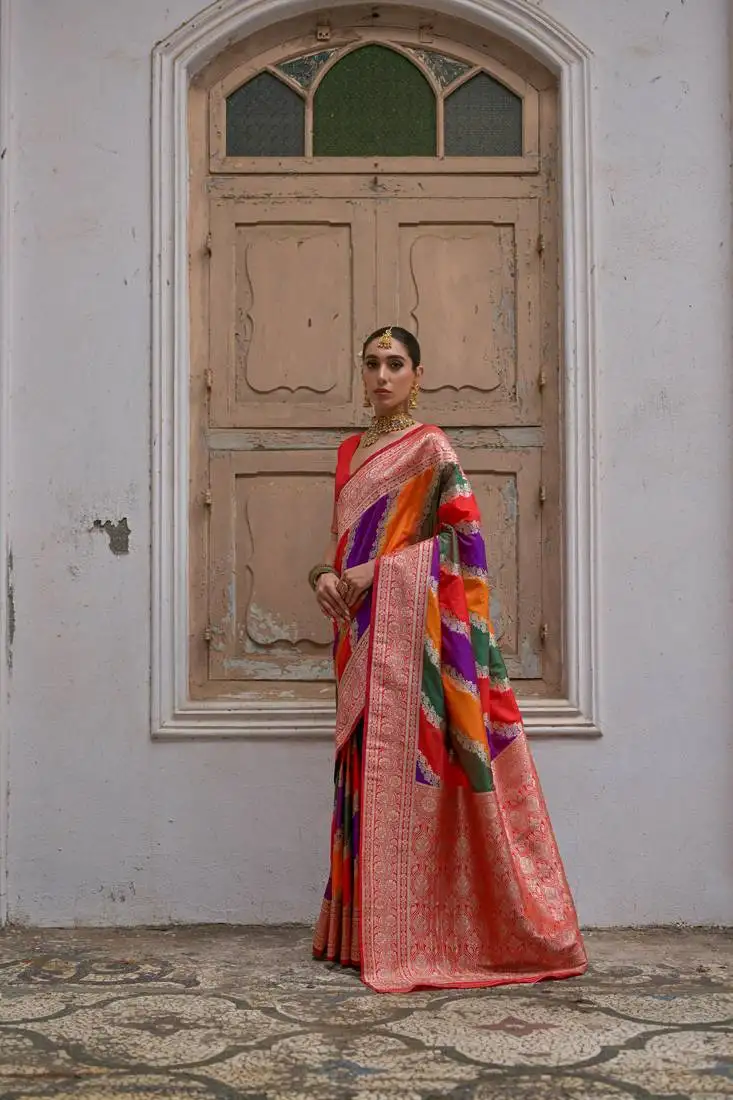 Red banarasi silk blend weaving saree with zari woven fancy tassels