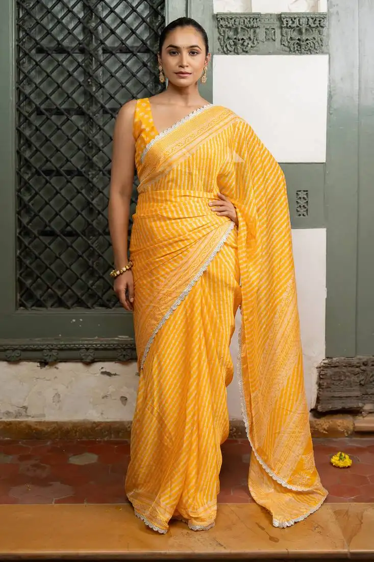Yellow chiffon stripes leheriya print zari work lace border saree with unstiched blouse piece