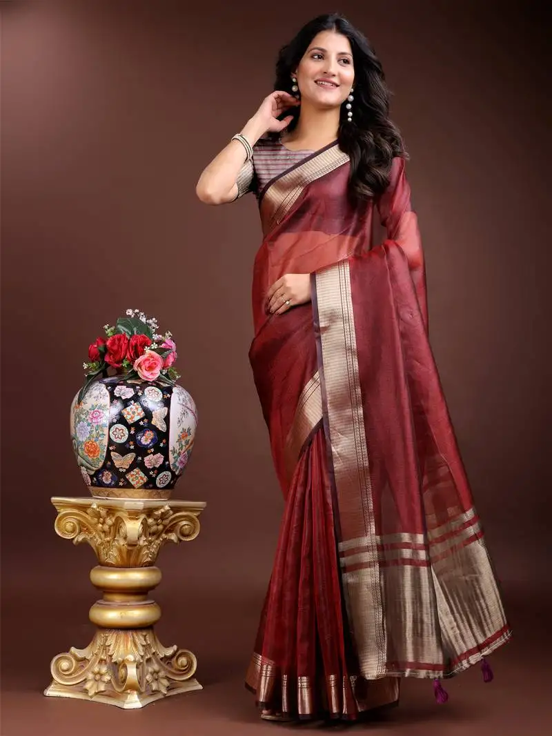 Red organza woven zari work tassel saree