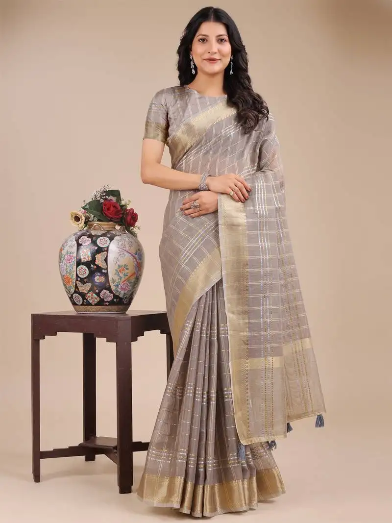 Tan organza woven zari work tassel saree