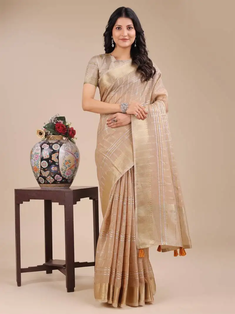 Cream organza woven zari work tassel saree