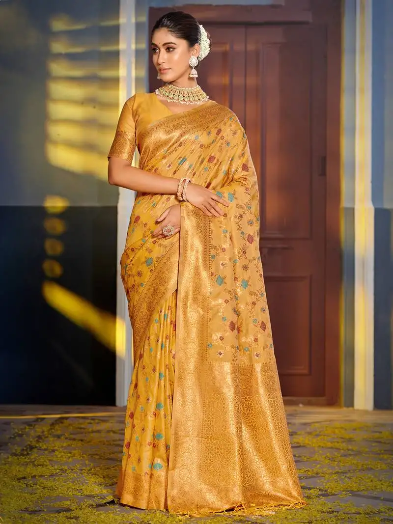 Yellow banarasi silk woven zari work tassel saree
