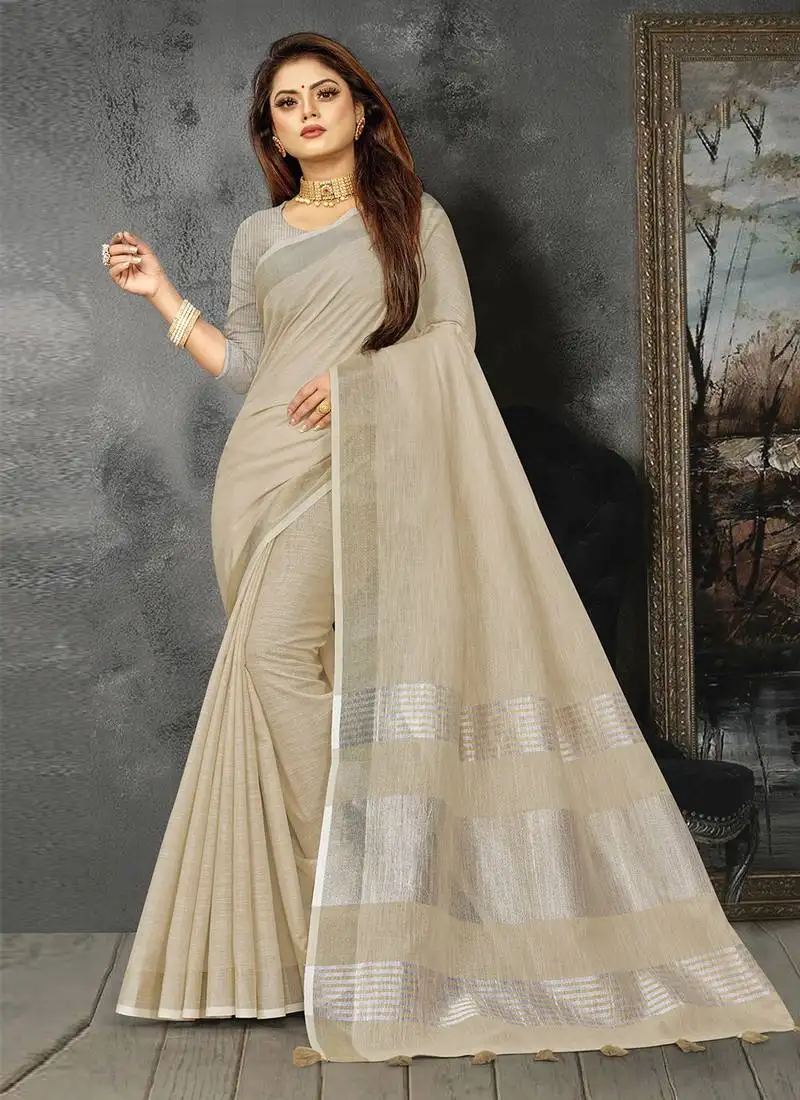 Cream linen cotton woven zari work tassel saree