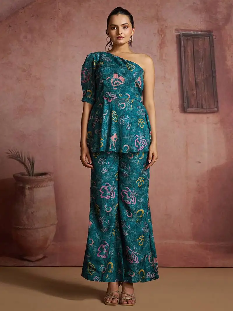 Teal floral one-shoulder peplum top and pants set