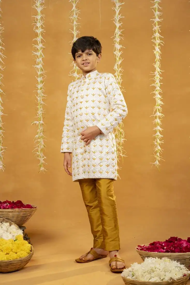 Embroidered off-white kurta and mustard coloured pant