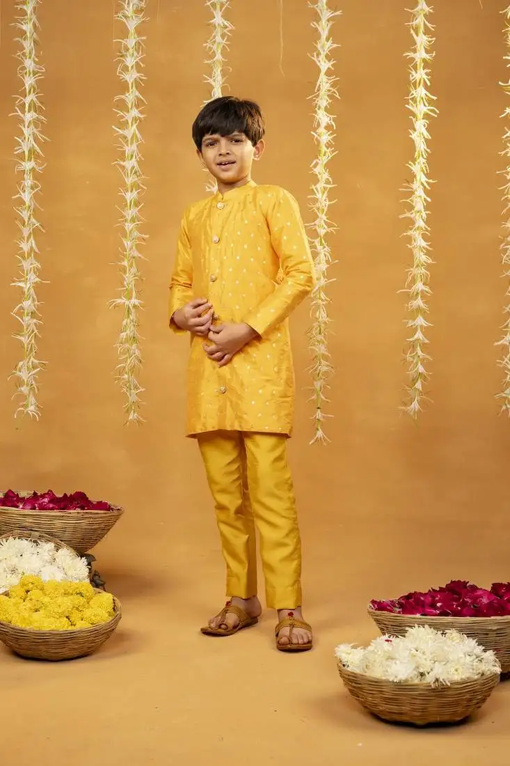 Yellow kurta with golden buti and pant