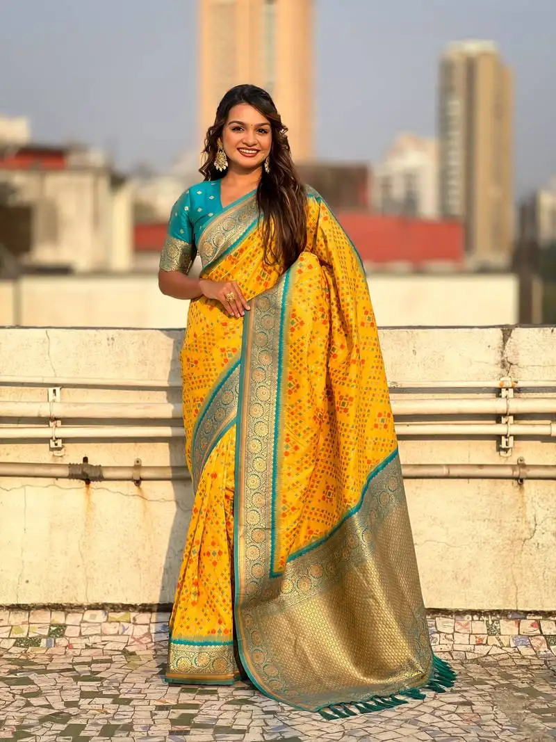 Yellow patola silk blend weaving ikkat meenakari designer saree