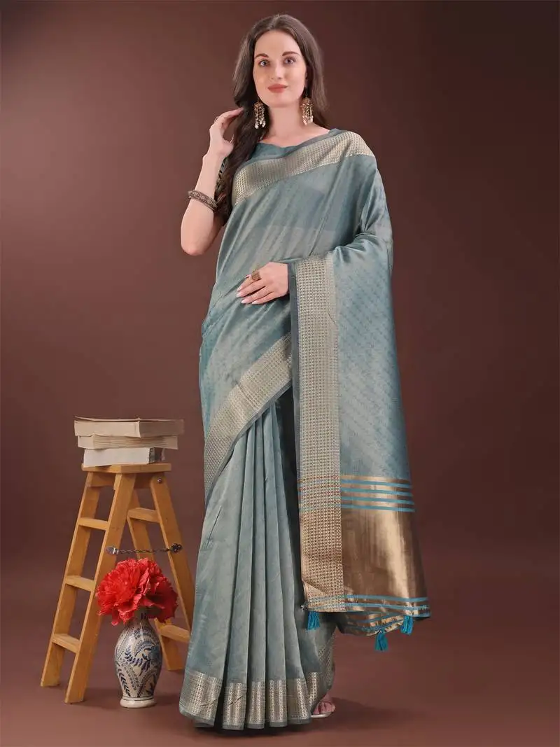 Sea green organza woven zari work tassel saree