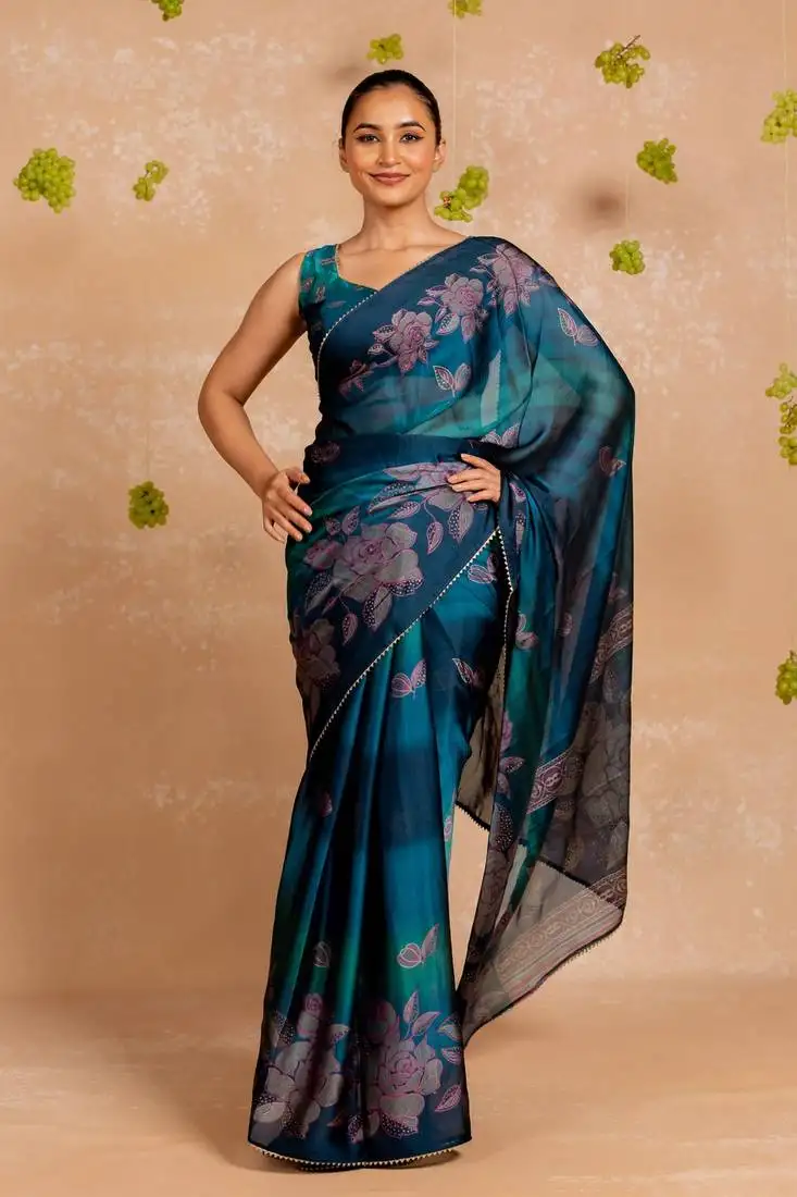 Teal blue chiffon foil foral print gota patti lace border saree with unstitched blouse piece