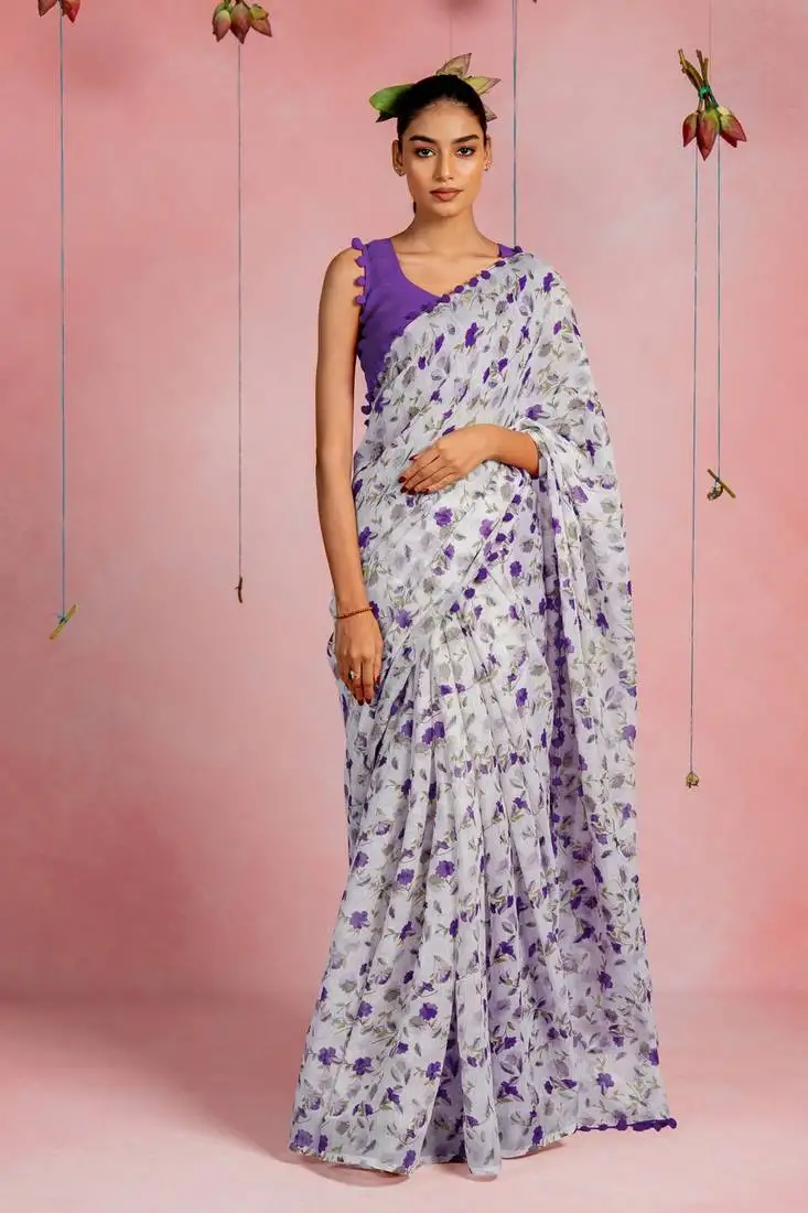 Off white cotton blend floral print pom pom lace border saree with unstitched blouse piece