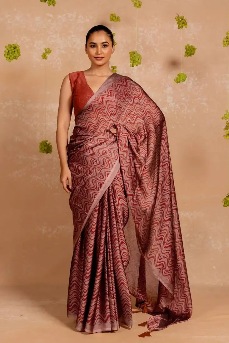 Dusty rust chiffon chevron print saree with unstitched blouse piece