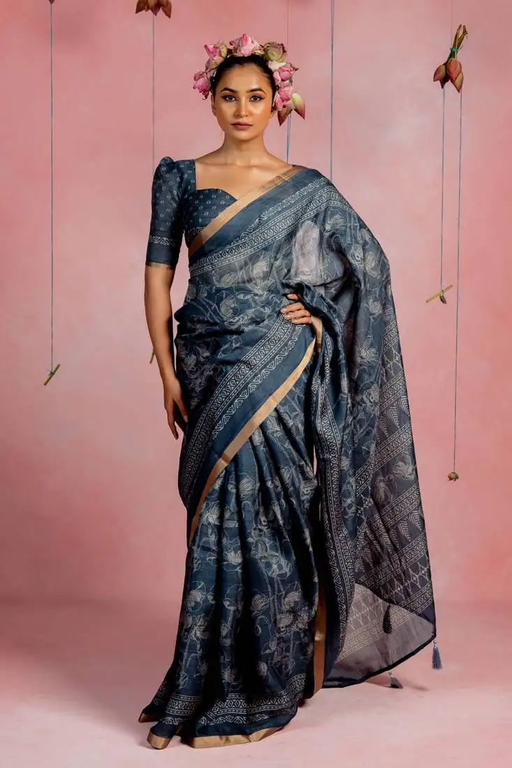 Dark dusty blue art silk floral print golden zari woven border saree with unstitched blouse piece
