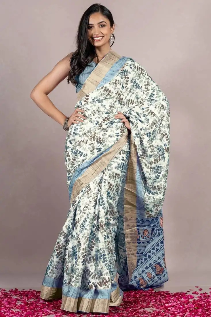 Off white silk blend abstract leaf print golden zari border saree with unstitched blouse piece