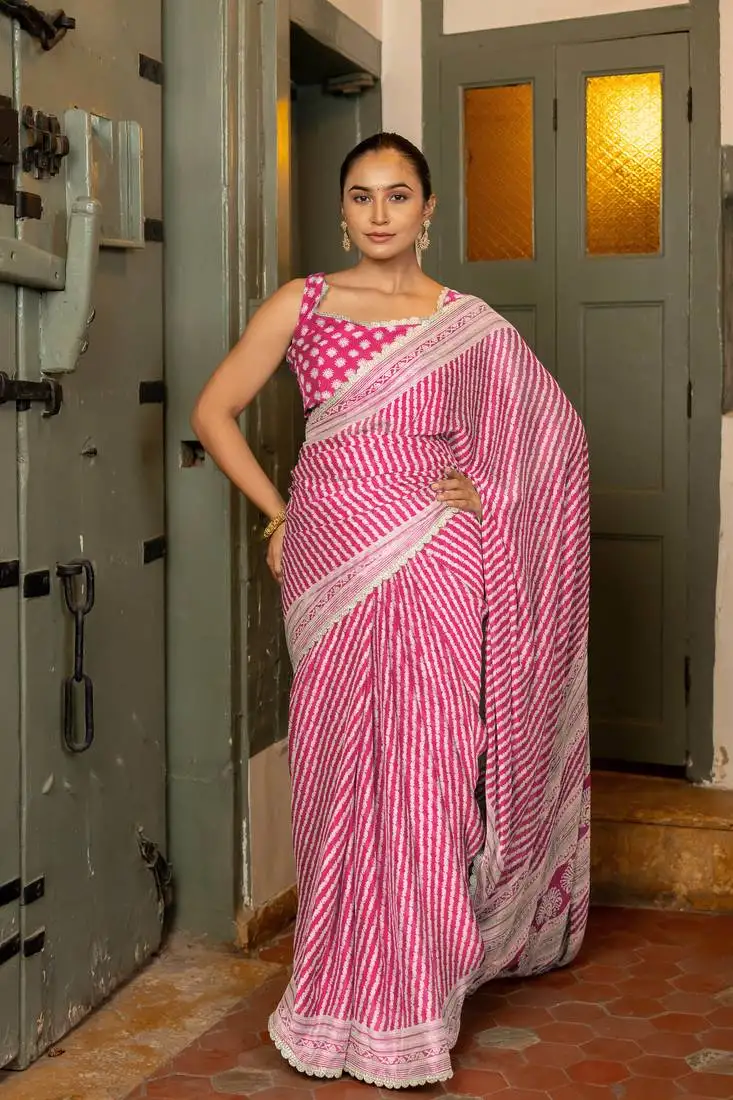Rani pink chiffon stripes leheriya print zari work lace border saree with unstiched blouse piece