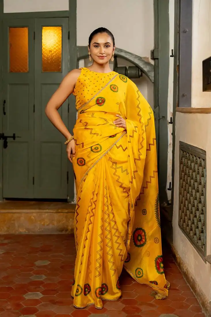 Dark yellow chiffon chevron zig zag block print lace border saree with unstiched blouse piece