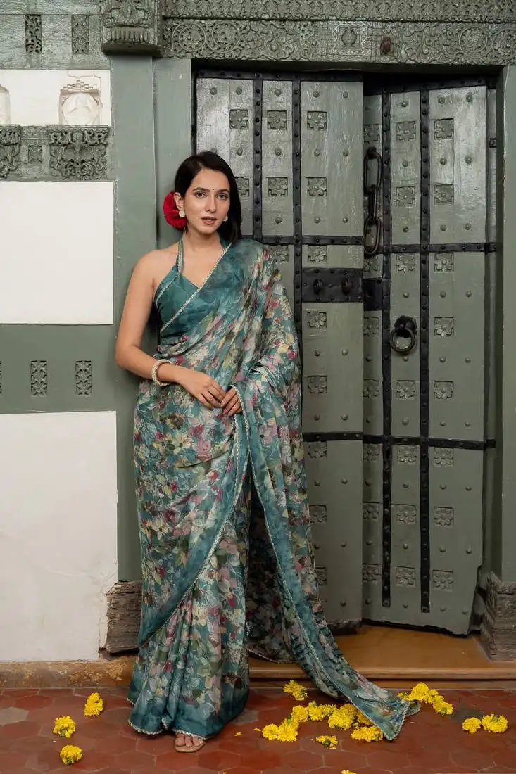 Dark turquoise blue chiffon floral print lace border saree with unstiched blouse piece