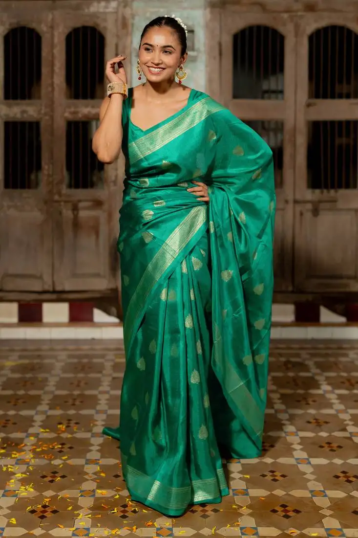 Green silk blend foil print woven design saree with unstiched blouse piece