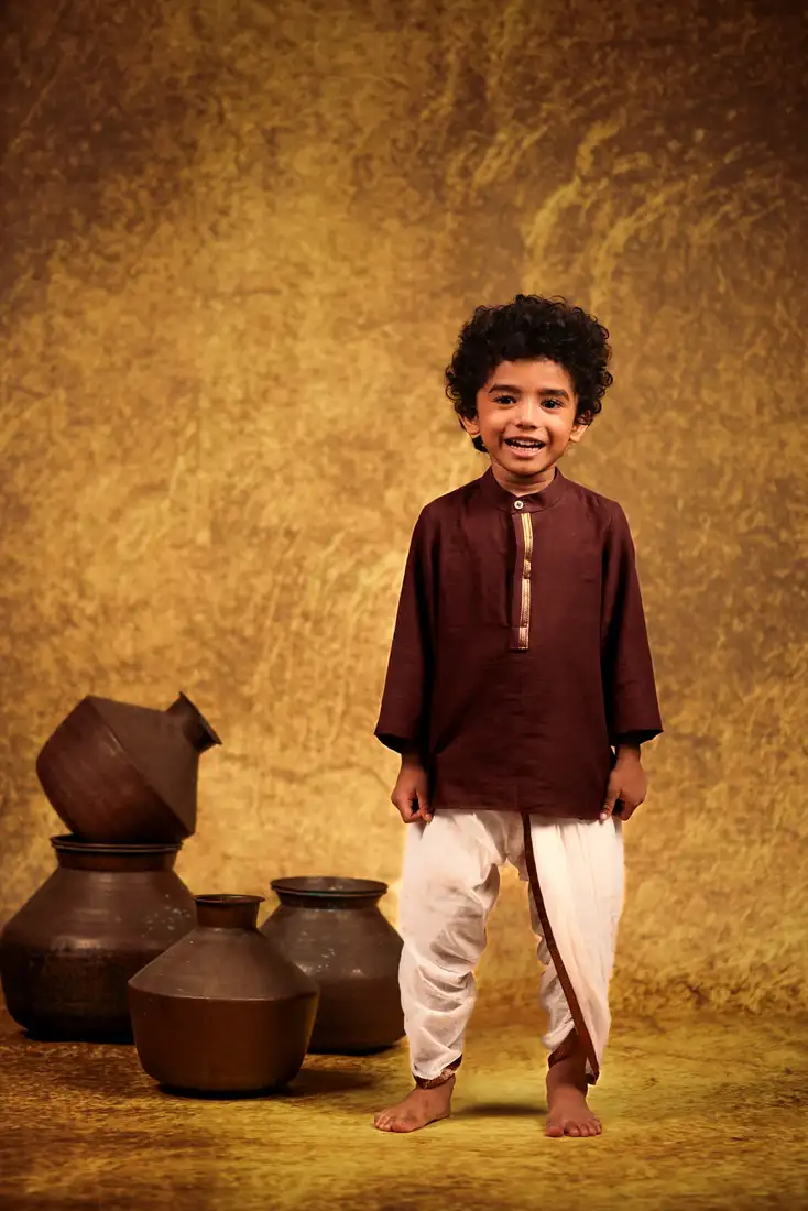 Red full sleeved short kurta and dhothi pant made from cotton for kids