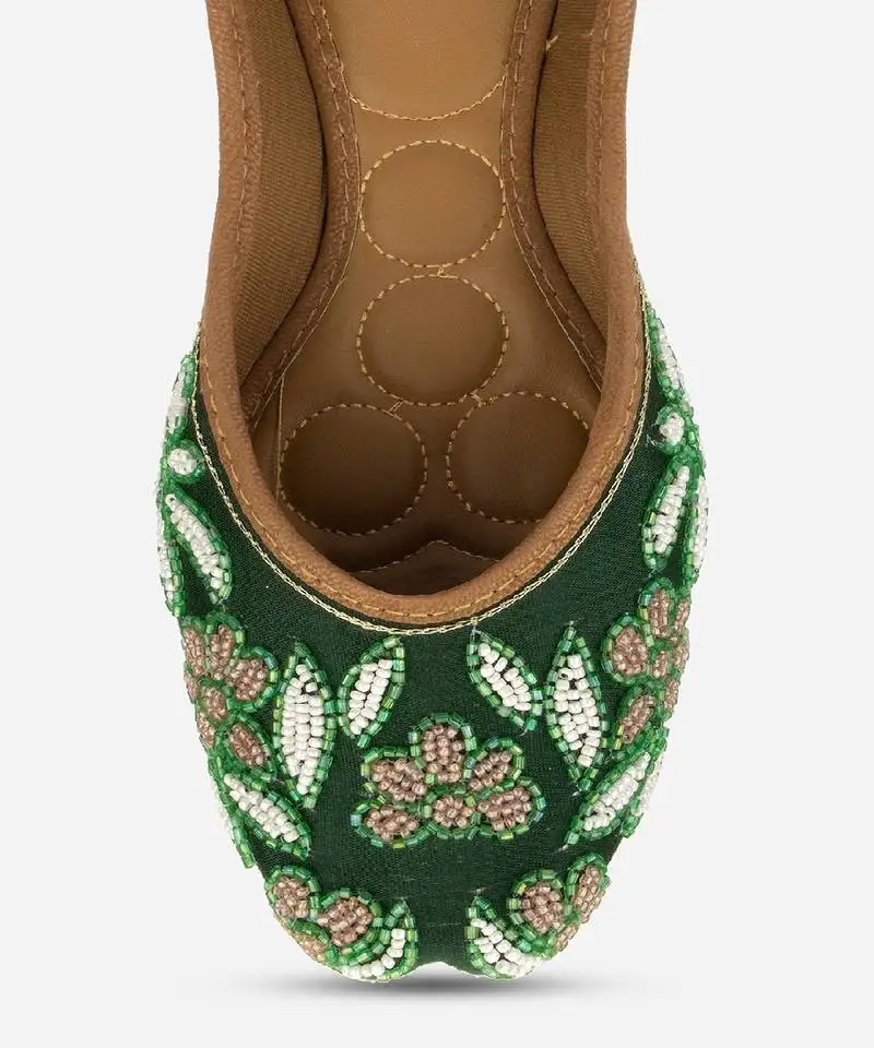 Green embroidered flats