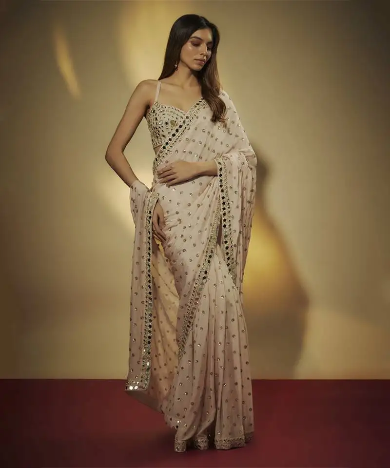 Pre drappe chinnon chiffon sequins and mirror work hand embroidered saree